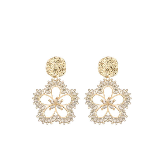 Bloemen oorstekers - beige