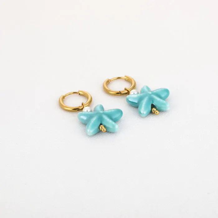 Zeester oorbellen turquoise - goud