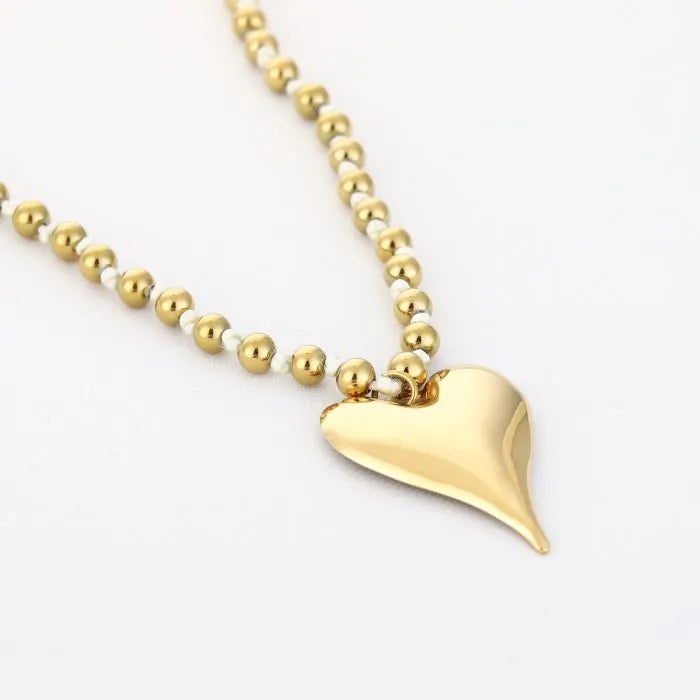 Bolletjes ketting met hart - beige