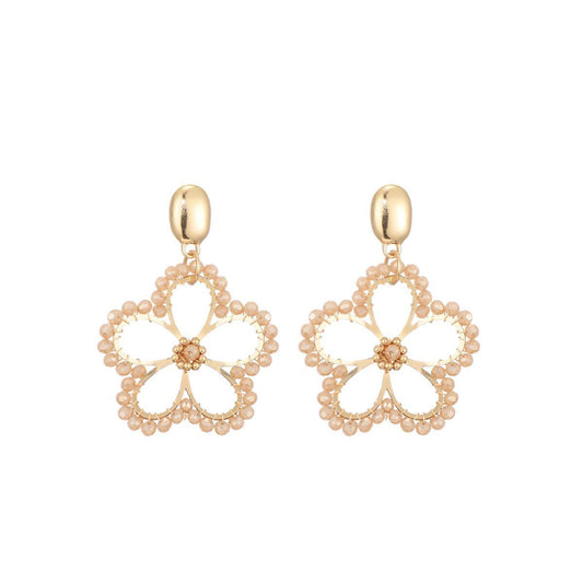 Bloemen oorstekers glaskralen - beige
