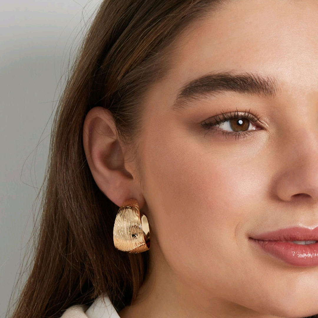 Ronde oorbellen met patroon - goud