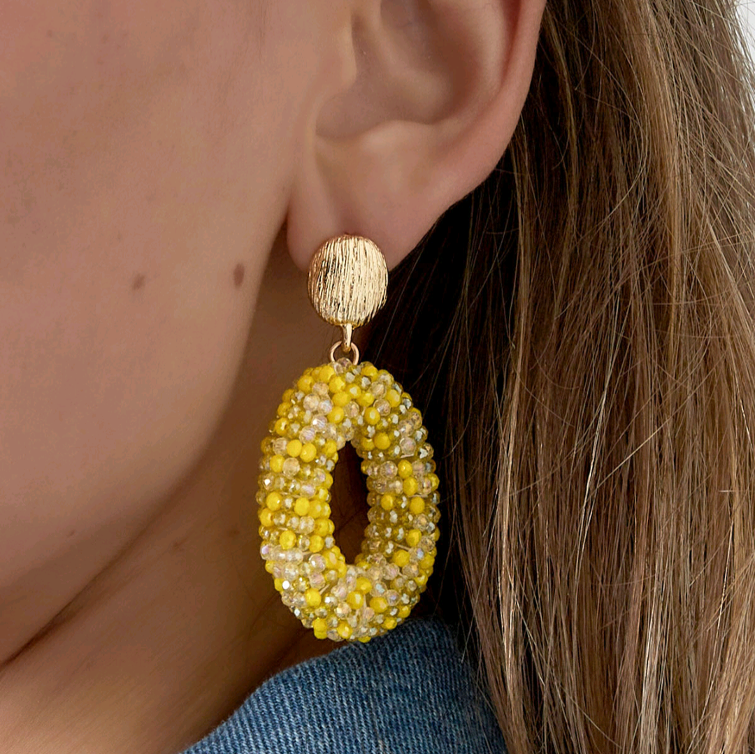 Ovale discodip oorbel - beige goud