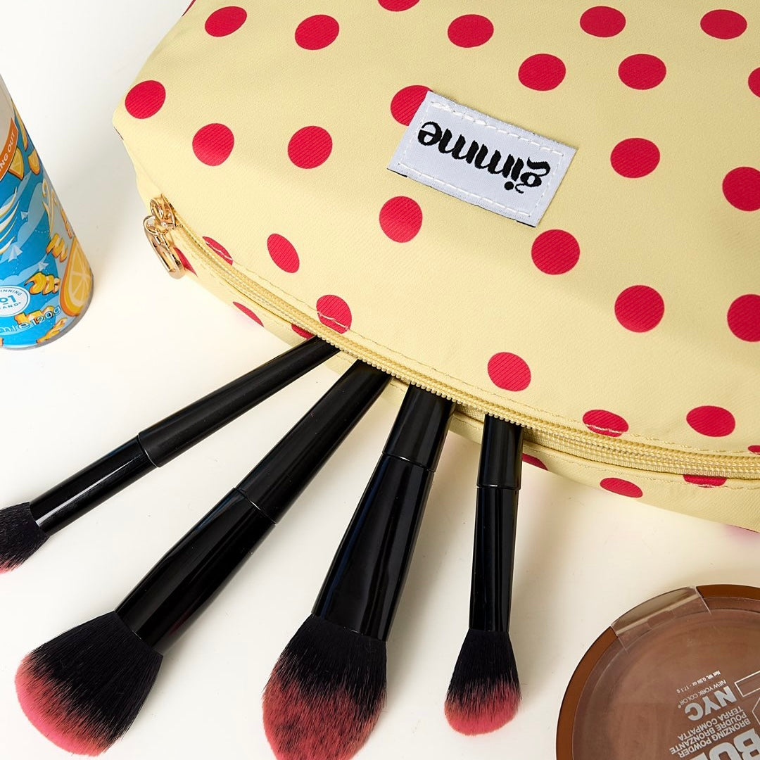 Make-Up tasje met stippen - geel