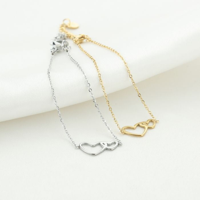 Twee hartjes armbandje - goud