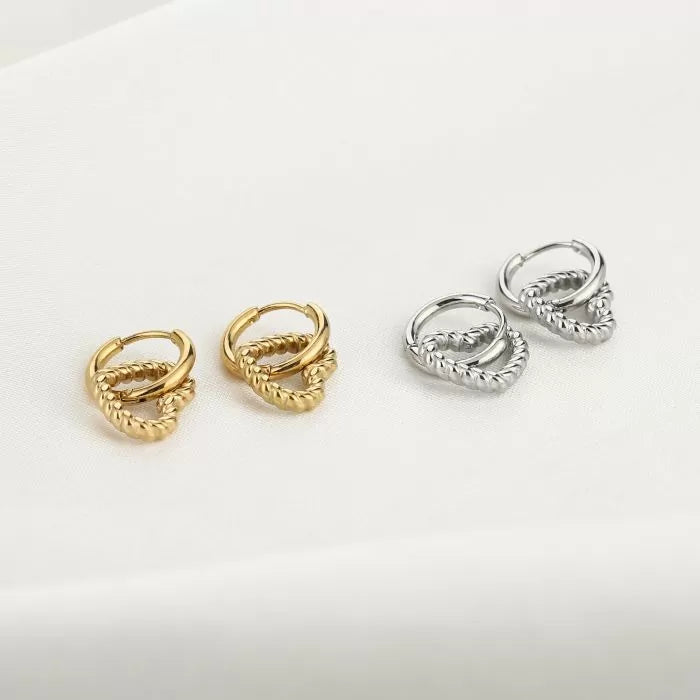 Gedraaide hartjes oorbellen - goud