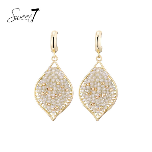 Sweet7 oorbellen - beige