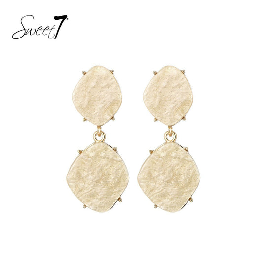 Sweet7 oorbellen - beige