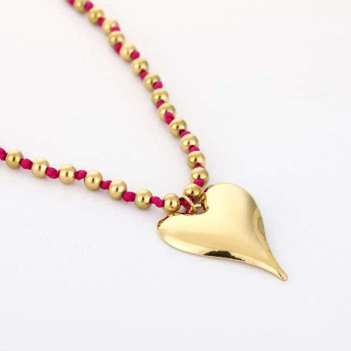 Bolletjes ketting met hart - fuchsia
